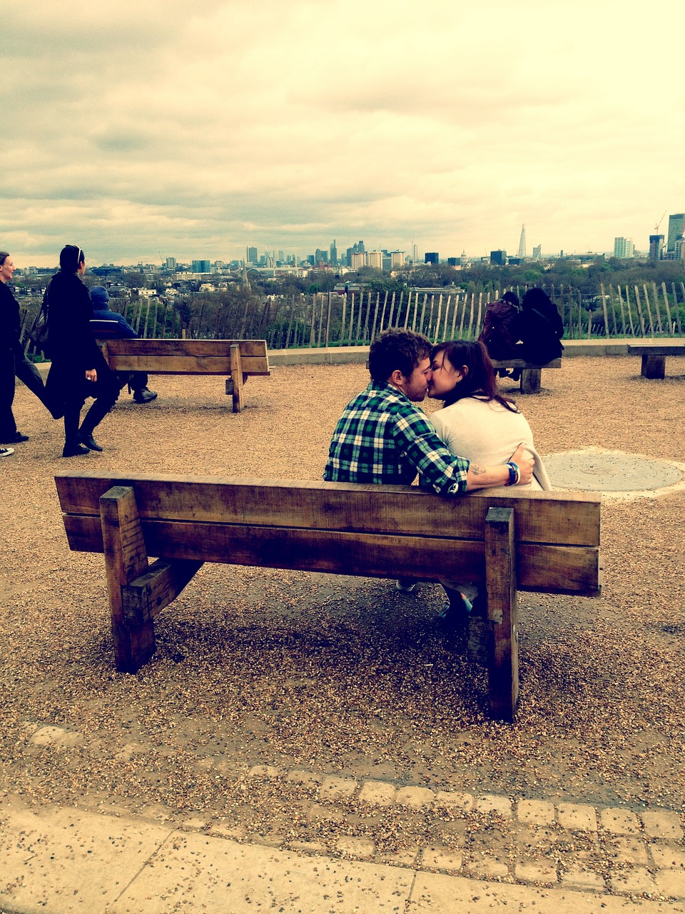 kiss on a park bench